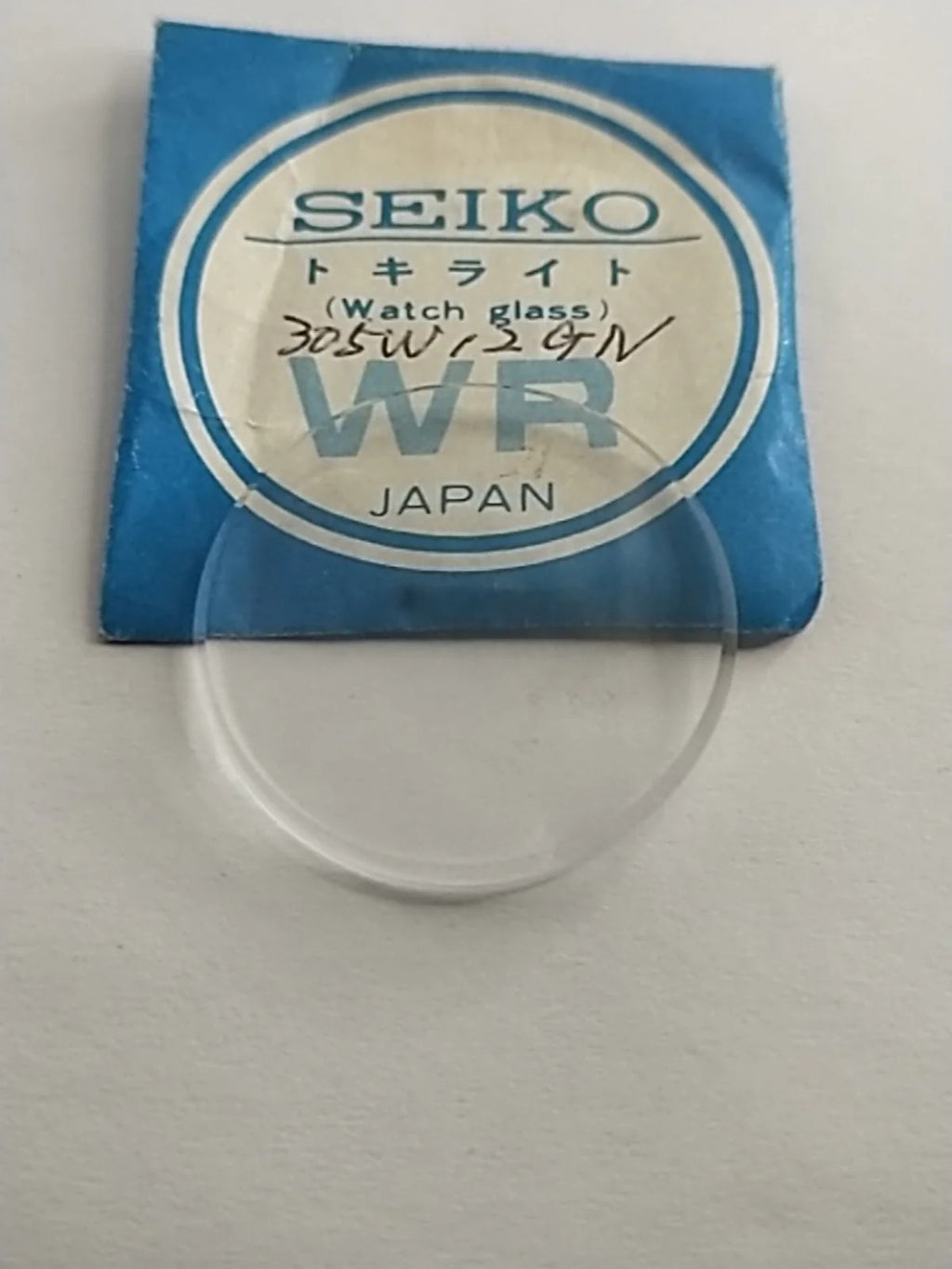 New Old Stok original Seiko glass 305W12GN
