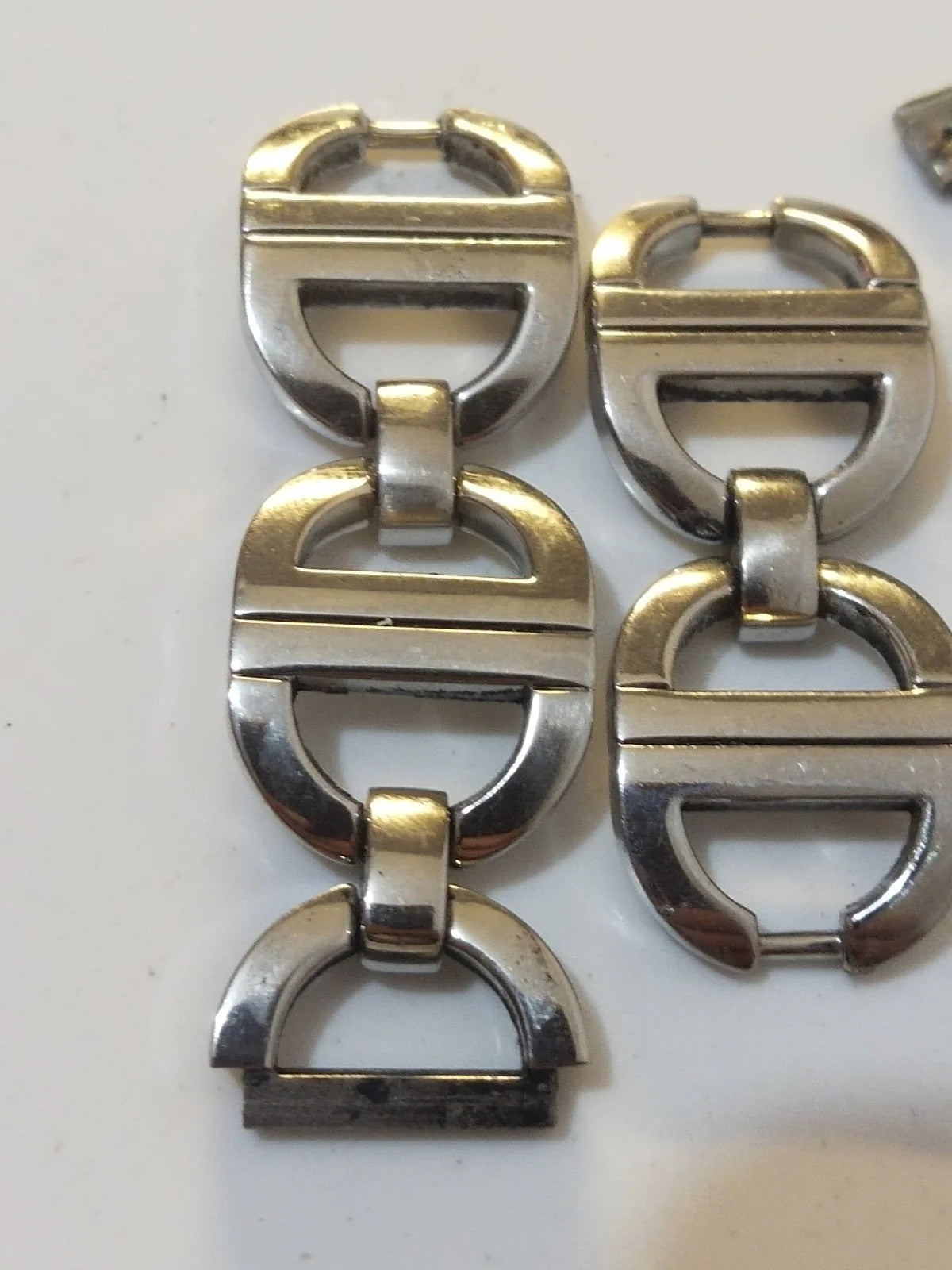 Christian Dior stainless steel link ........ used Price for one piece