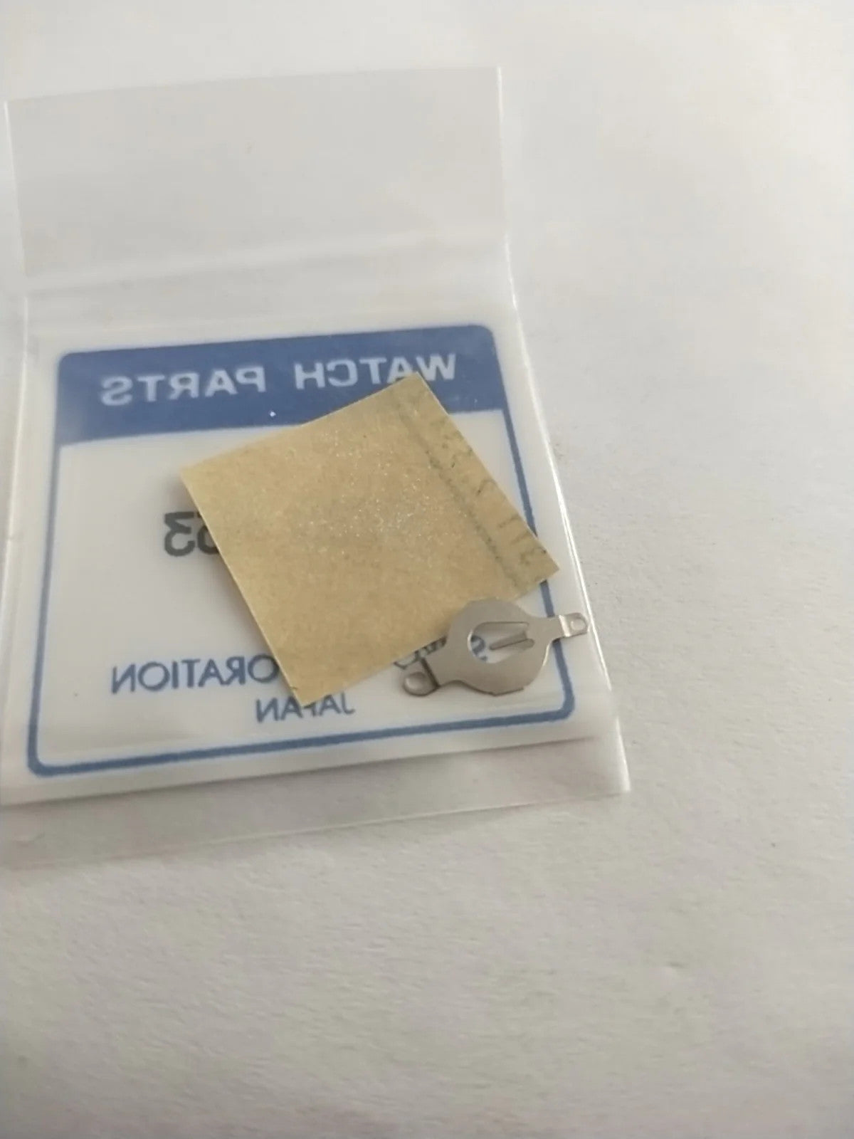 ORIGINAL SEIKO PARTS /BATTERY BRIDLE SPRING / Part . 4225 453