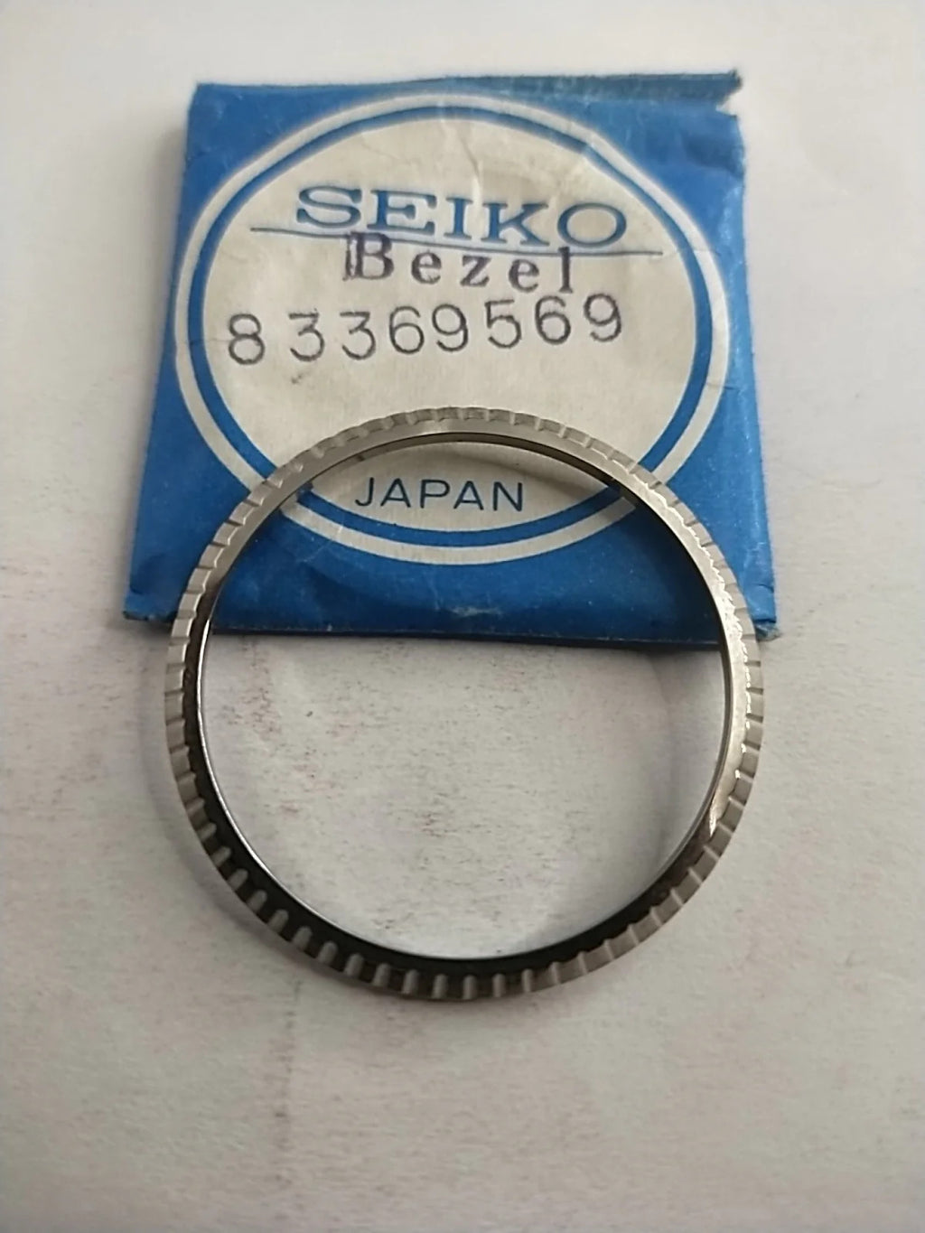 NOS Seiko original Bezel / Part 8336 9569