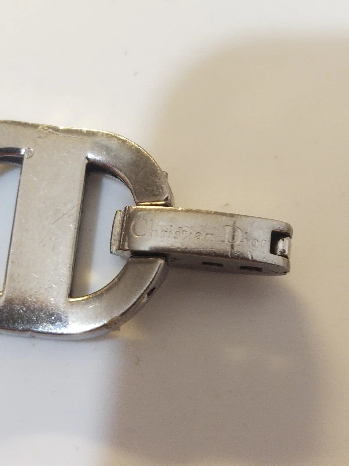Christian Dior stainless steel link ........ used Price for one piece