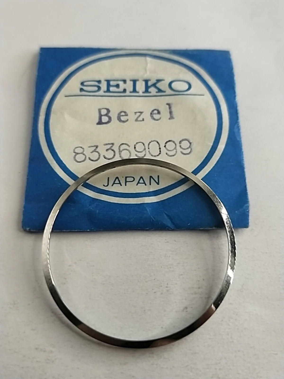 NOS Seiko original Bezel / Part 8336 9099
