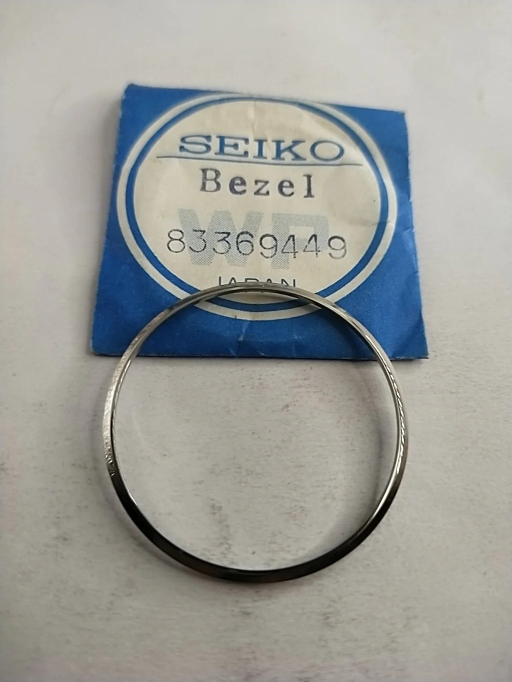 NOS Seiko original Bezel / Part 8336 9449