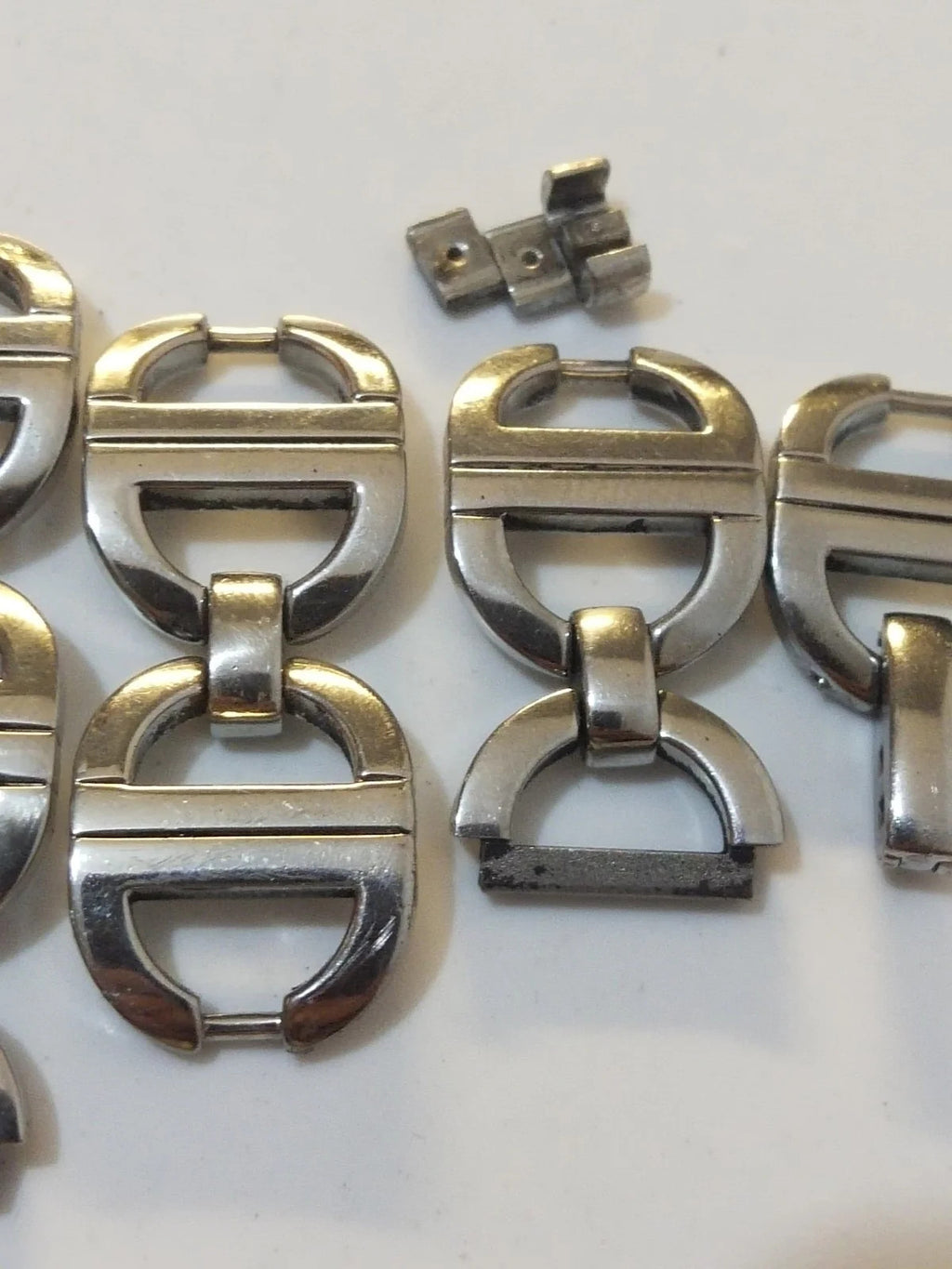 Christian Dior stainless steel link ........ used Price for one piece