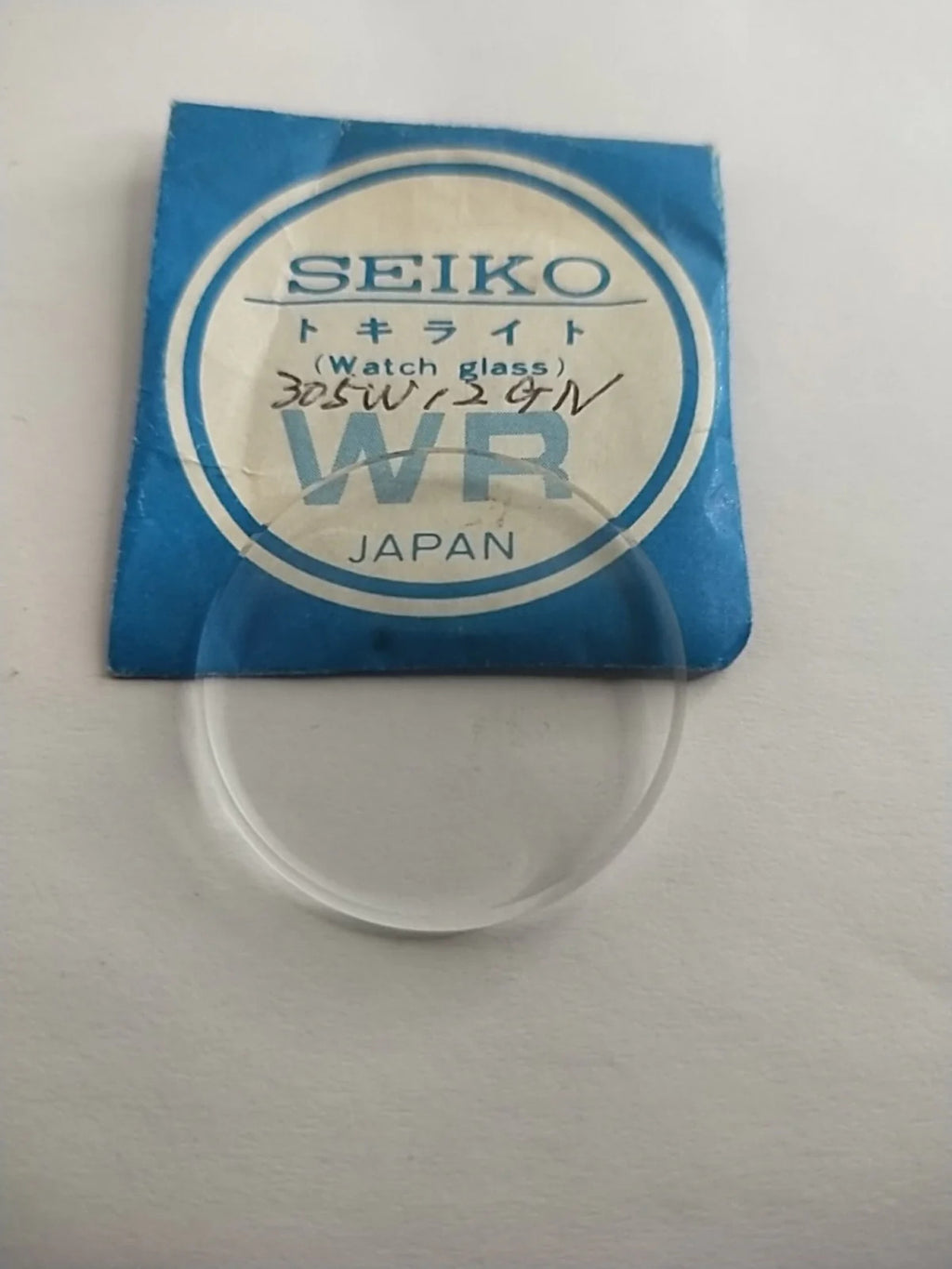 New Old Stok original Seiko glass 305W12GN