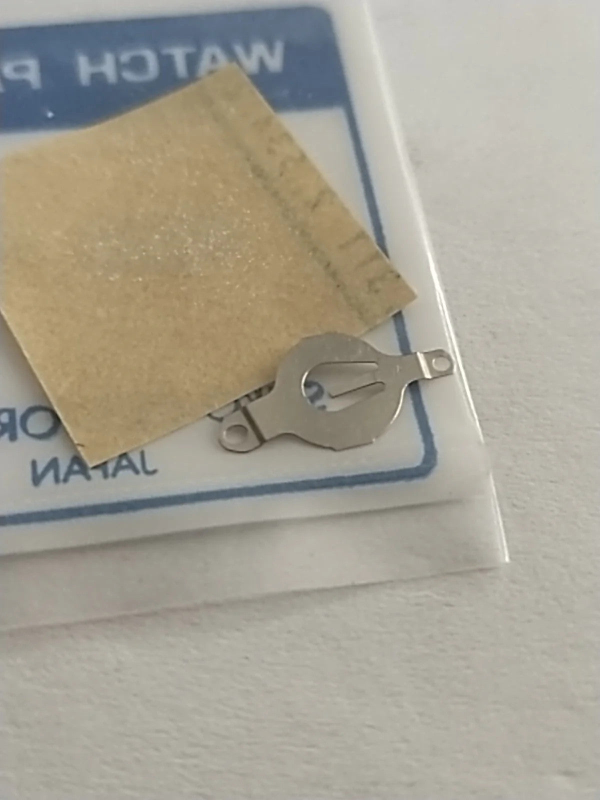 ORIGINAL SEIKO PARTS /BATTERY BRIDLE SPRING / Part . 4225 453