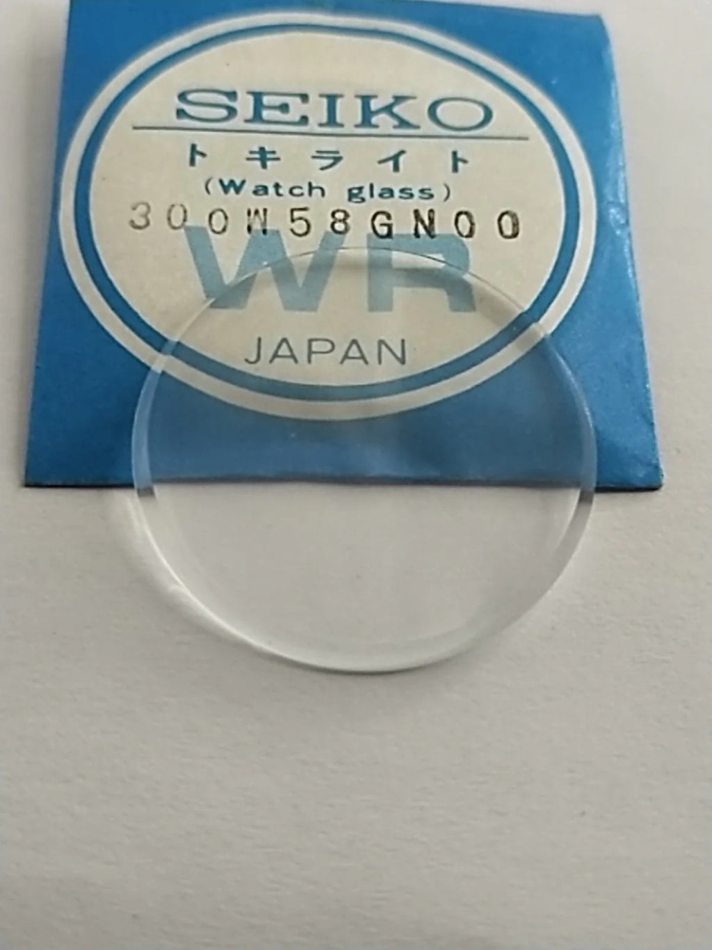 New Old Stok original Seiko glass 300W58GN