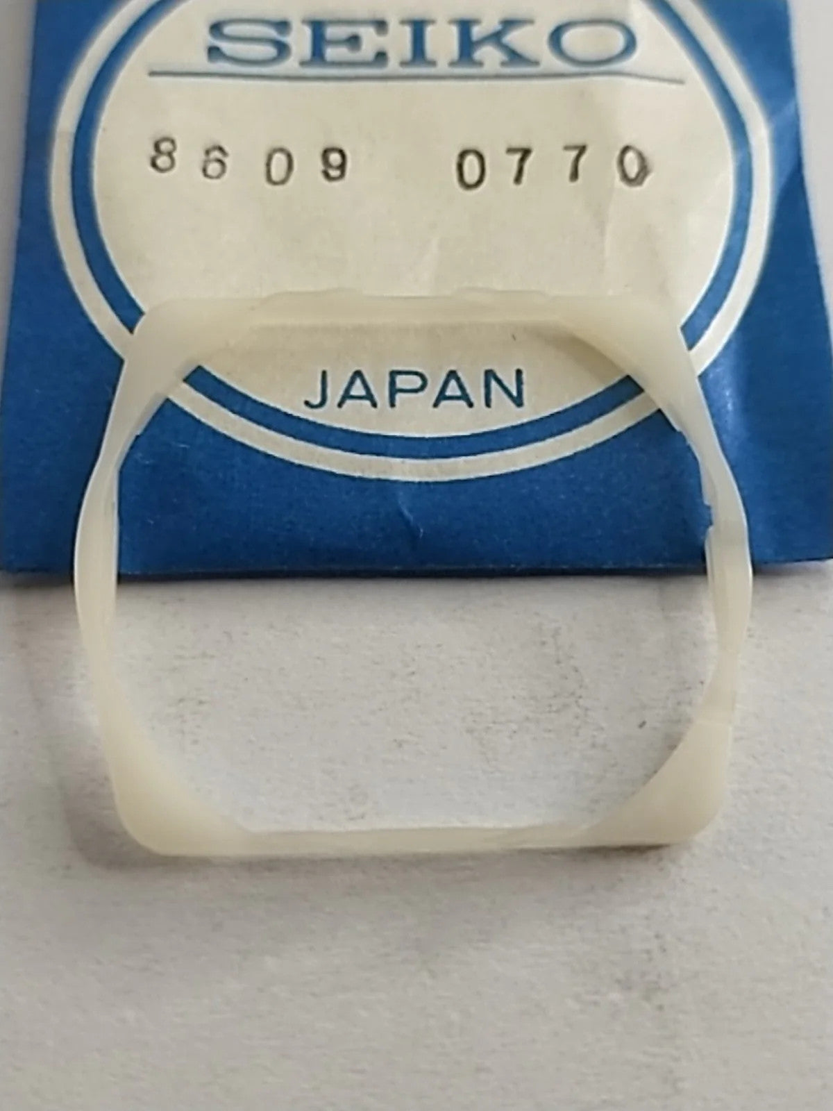 NOS Seiko Part . 8609 0770 / Holdingring For gasket