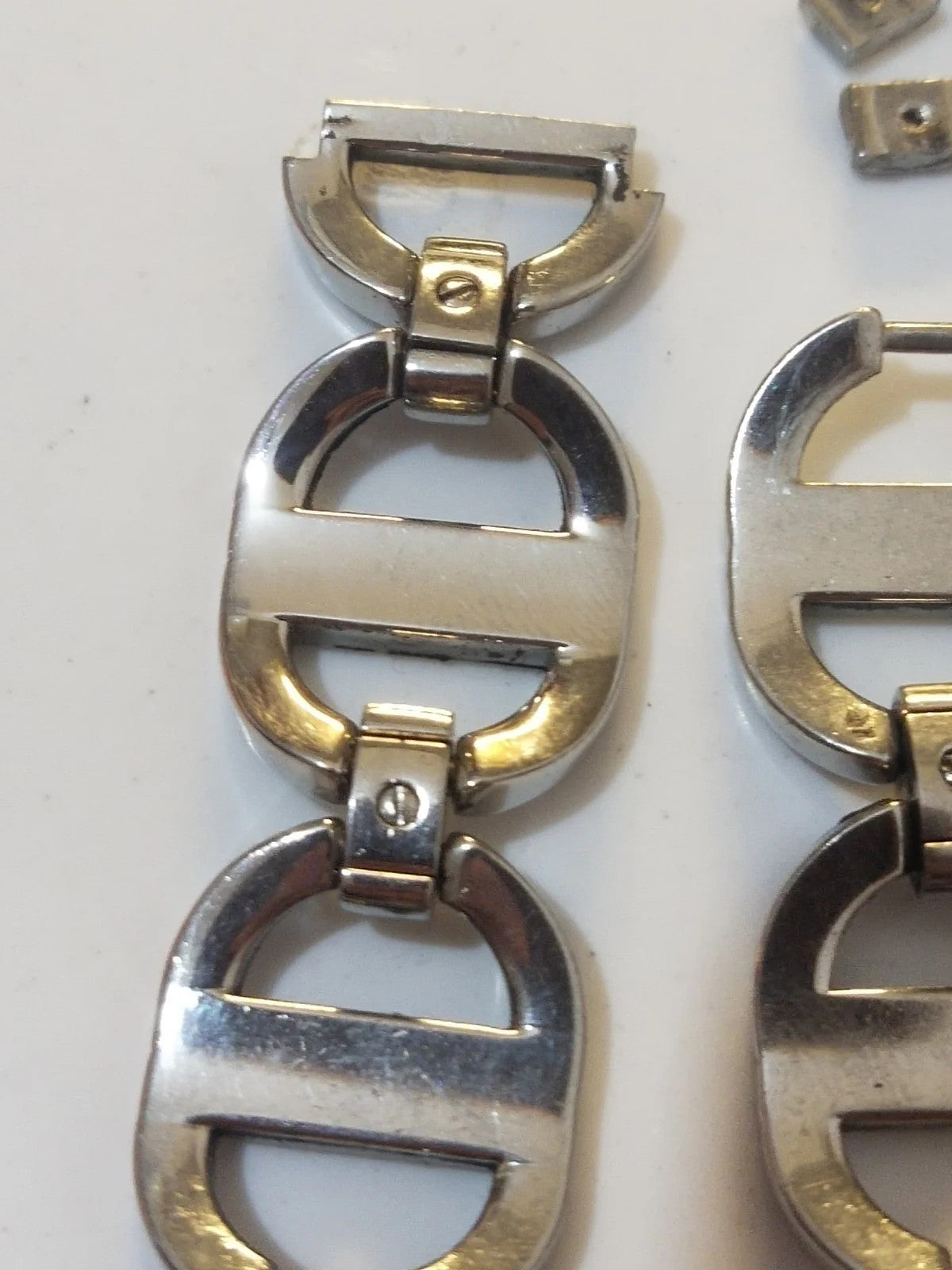 Christian Dior stainless steel link ........ used Price for one piece