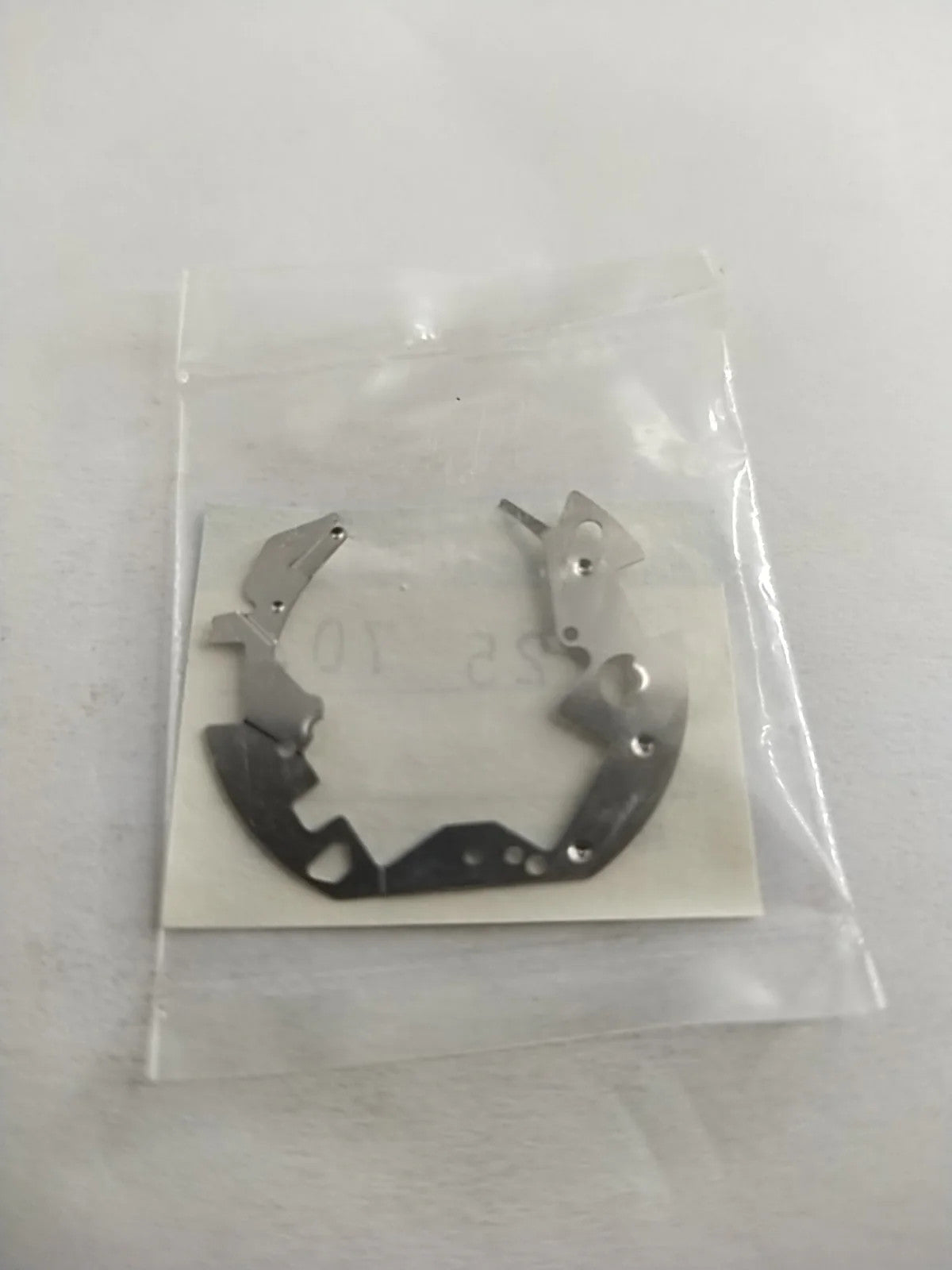 ORIGINAL SEIKO PARTS /BATTERY BRIDLE SPRING / Part . 4225 703