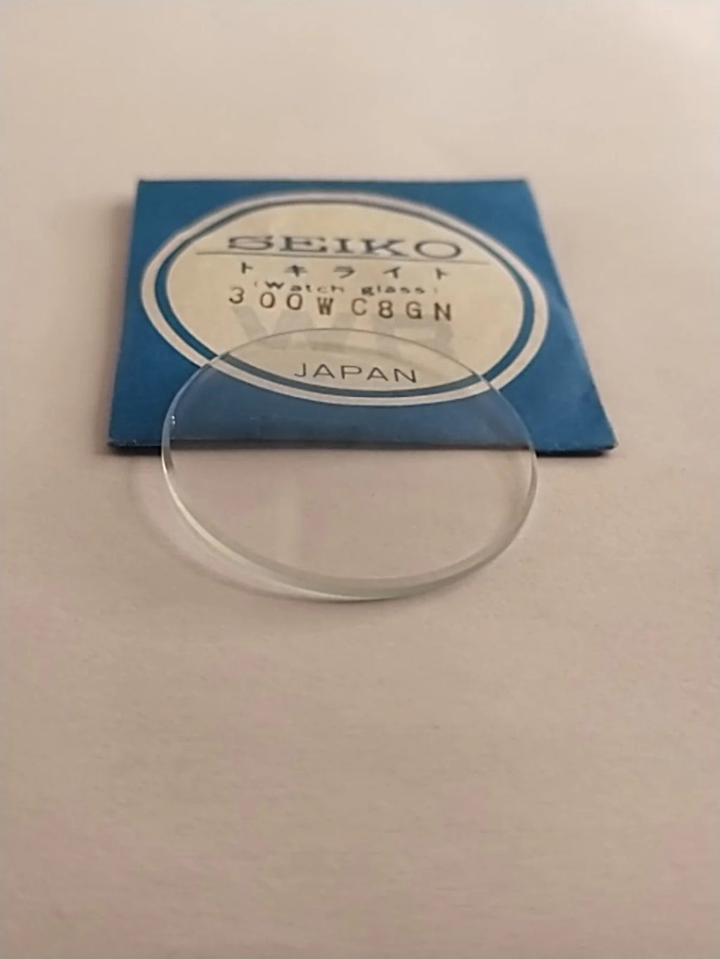 New Old Stok original Seiko glass 300WC8GN