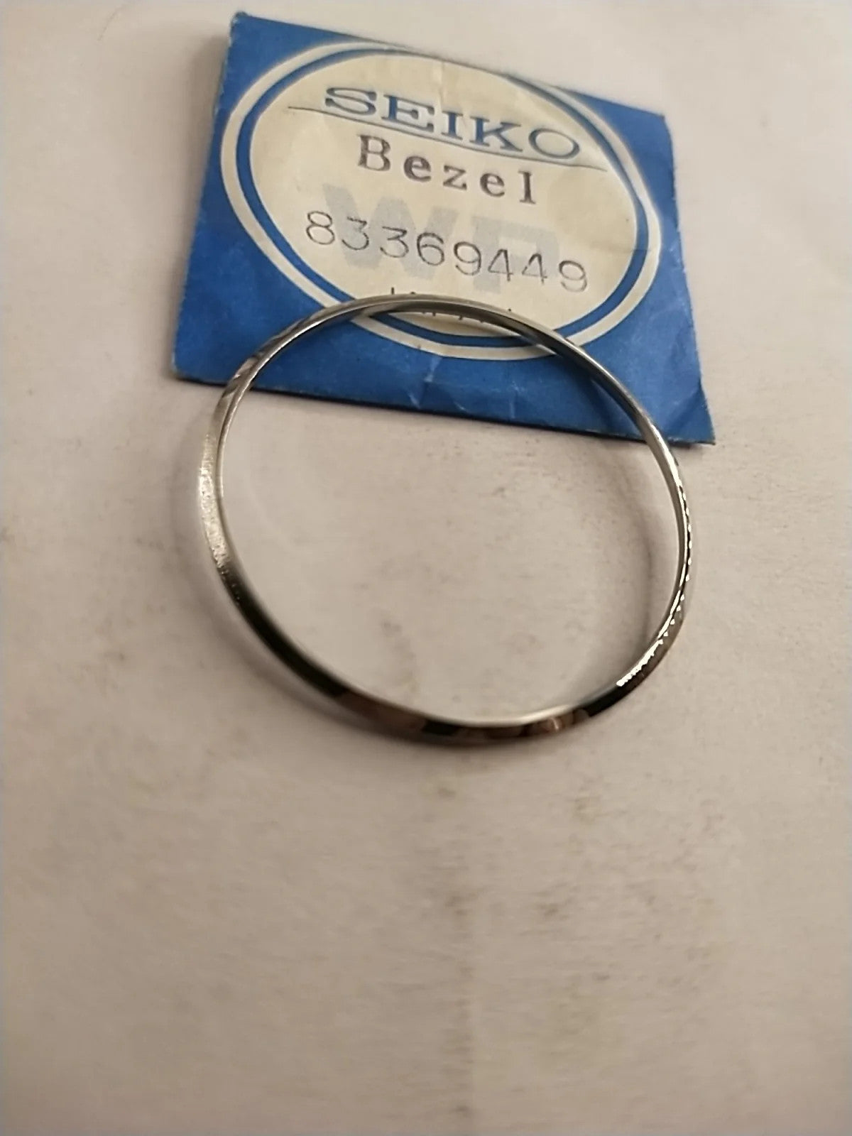 NOS Seiko original Bezel / Part 8336 9449