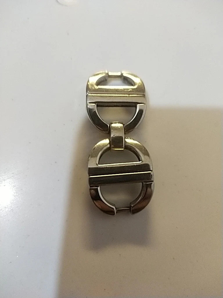 Christian Dior stainless steel link ........ used Price for one piece