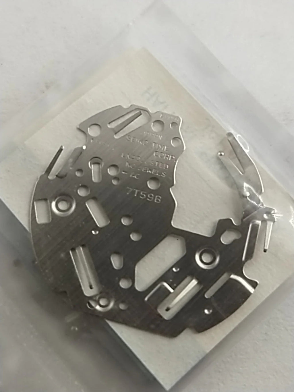 ORIGINAL SEIKO PARTS /BATTERY BRIDLE SPRING / Part . 4225 727