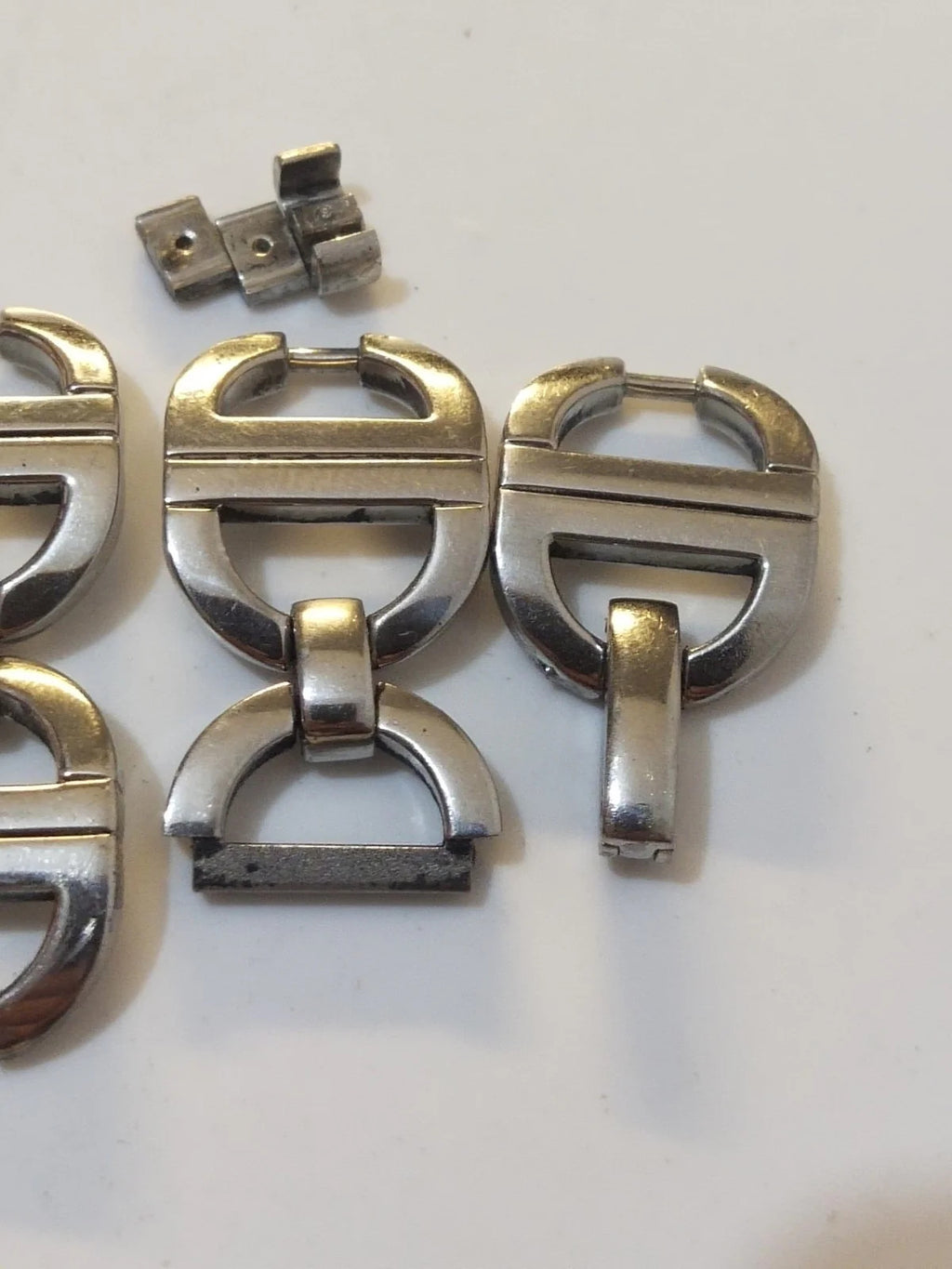 Christian Dior stainless steel link ........ used Price for one piece