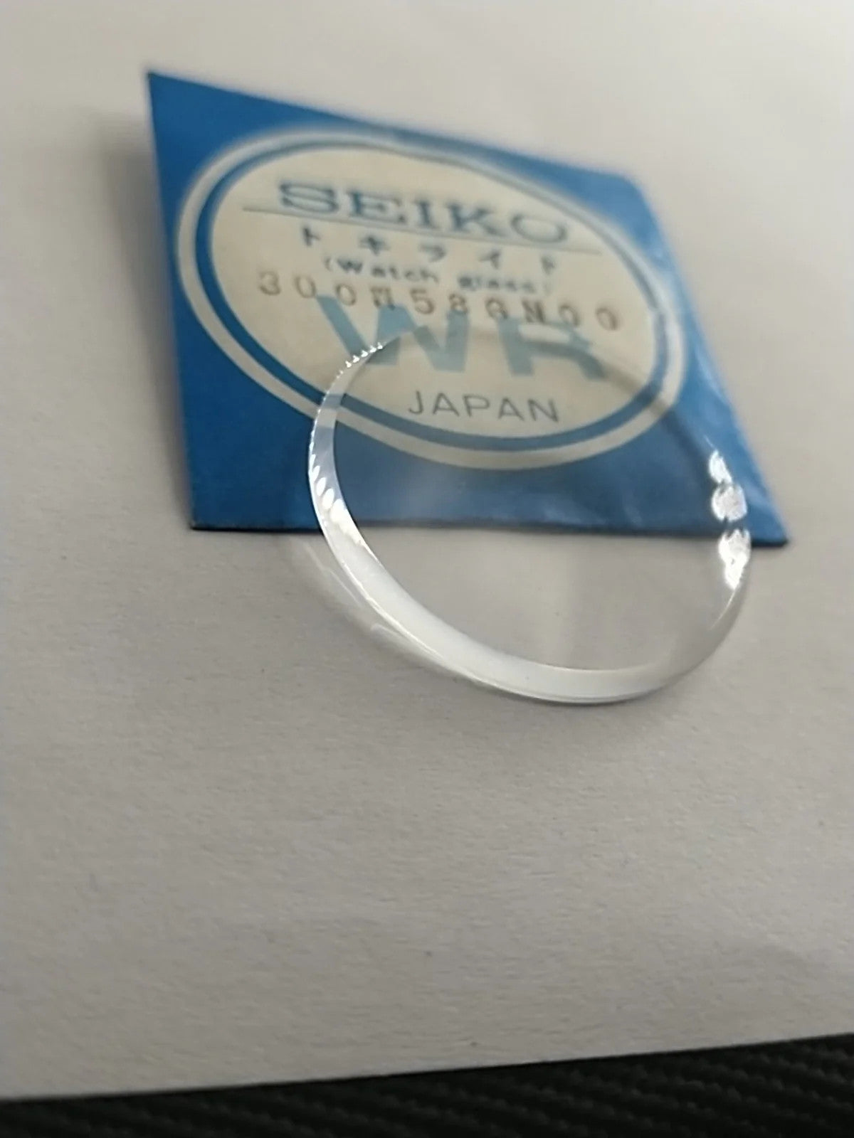 New Old Stok original Seiko glass 300W58GN