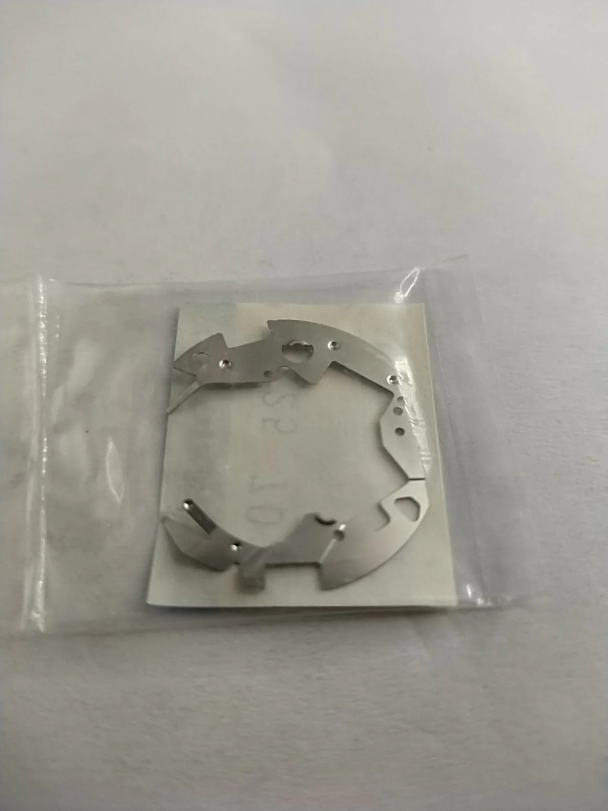 ORIGINAL SEIKO PARTS /BATTERY BRIDLE SPRING / Part . 4225 703