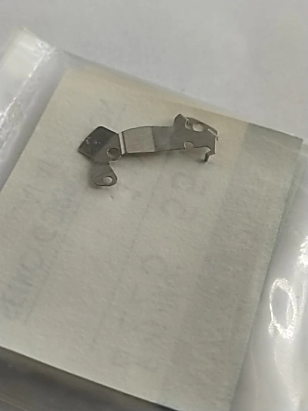 ORIGINAL SEIKO PARTS /BATTERY BRIDLE SPRING / Part . 4225 551