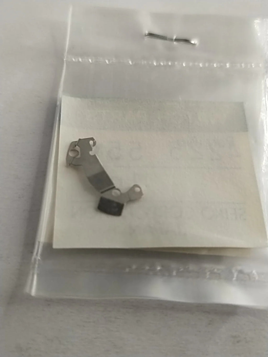 ORIGINAL SEIKO PARTS /BATTERY BRIDLE SPRING / Part . 4225 551