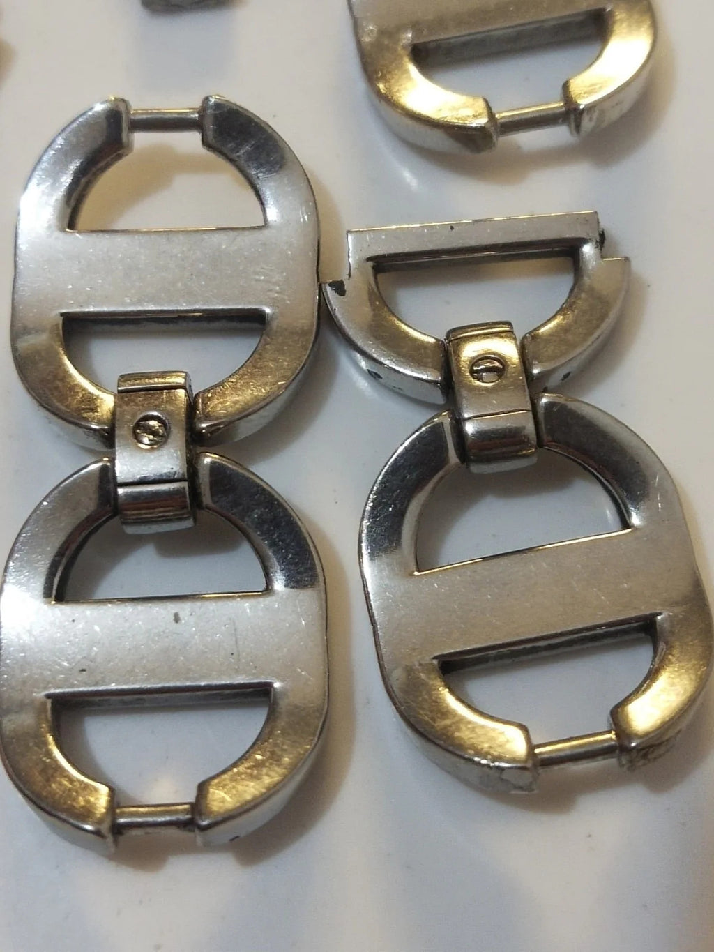 Christian Dior stainless steel link ........ used Price for one piece