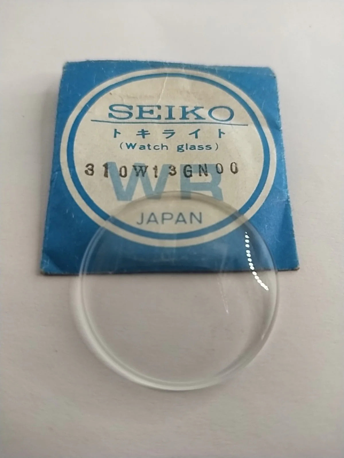 New Old Stok original Seiko glass 310W13GN00