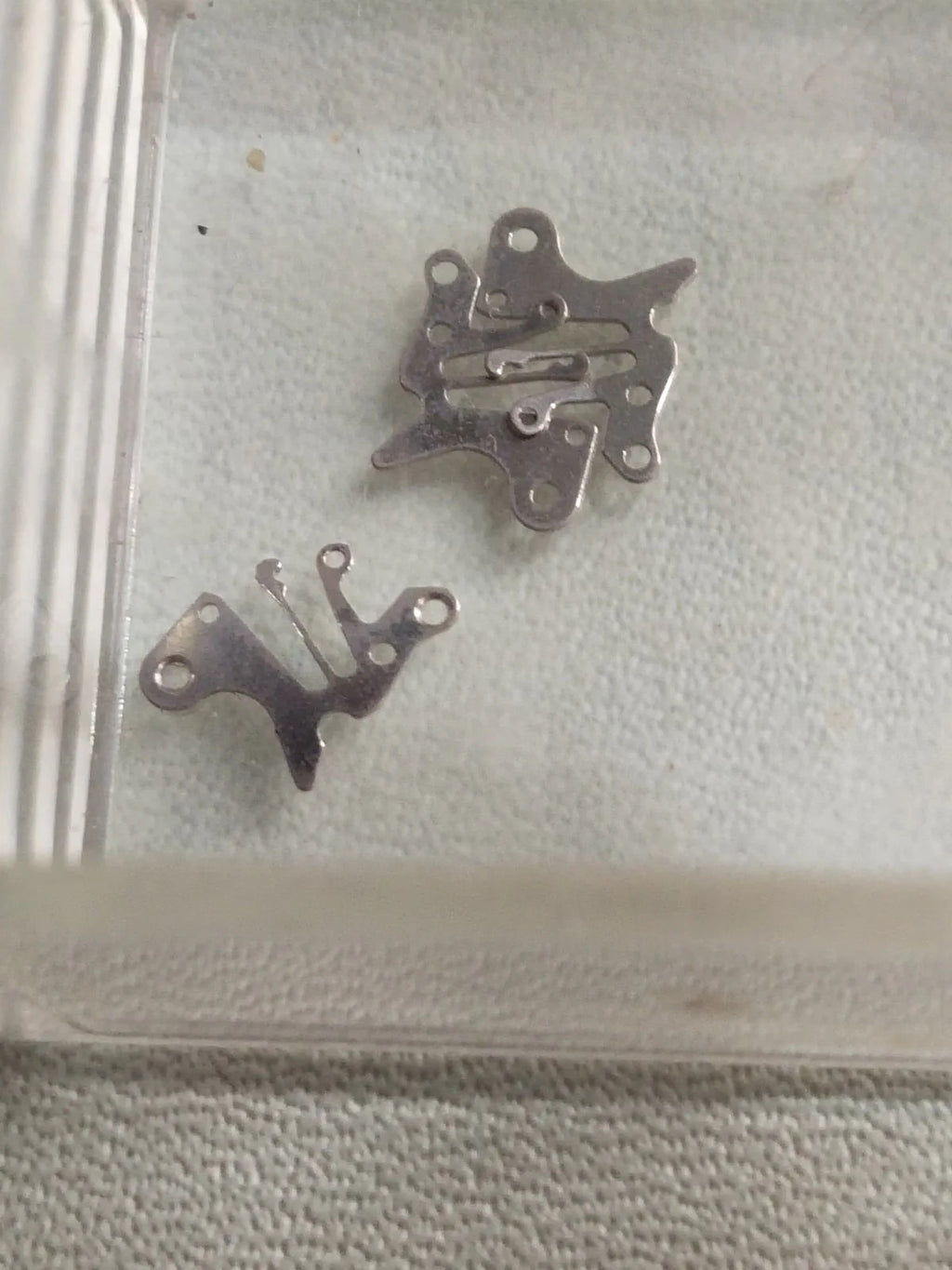 Seiko Part. 386 110 Sitting lever Spring Cal. 1104A (1pc