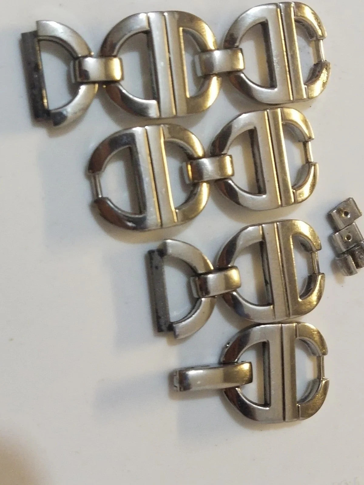 Christian Dior stainless steel link ........ used Price for one piece