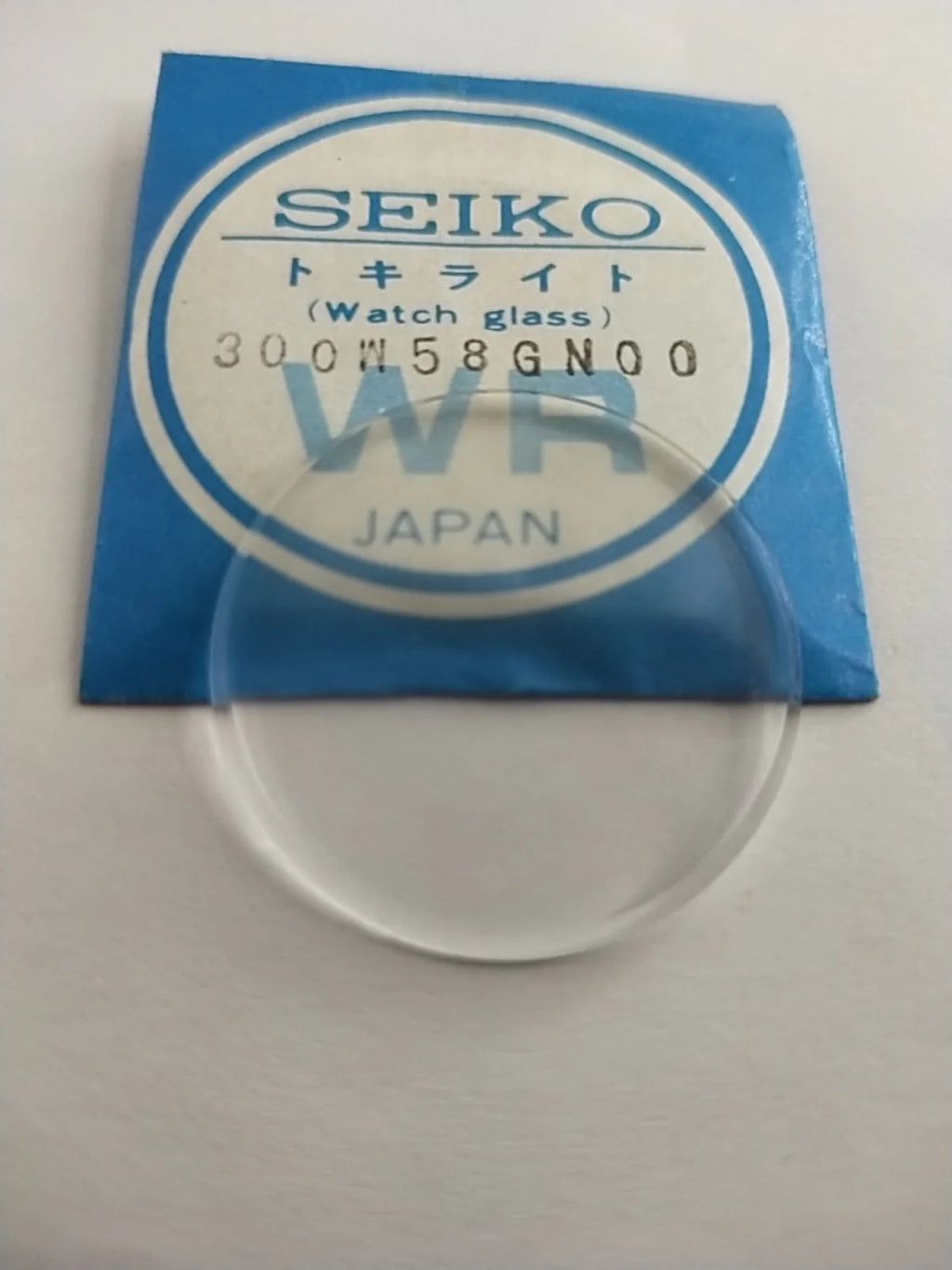 New Old Stok original Seiko glass 300W58GN