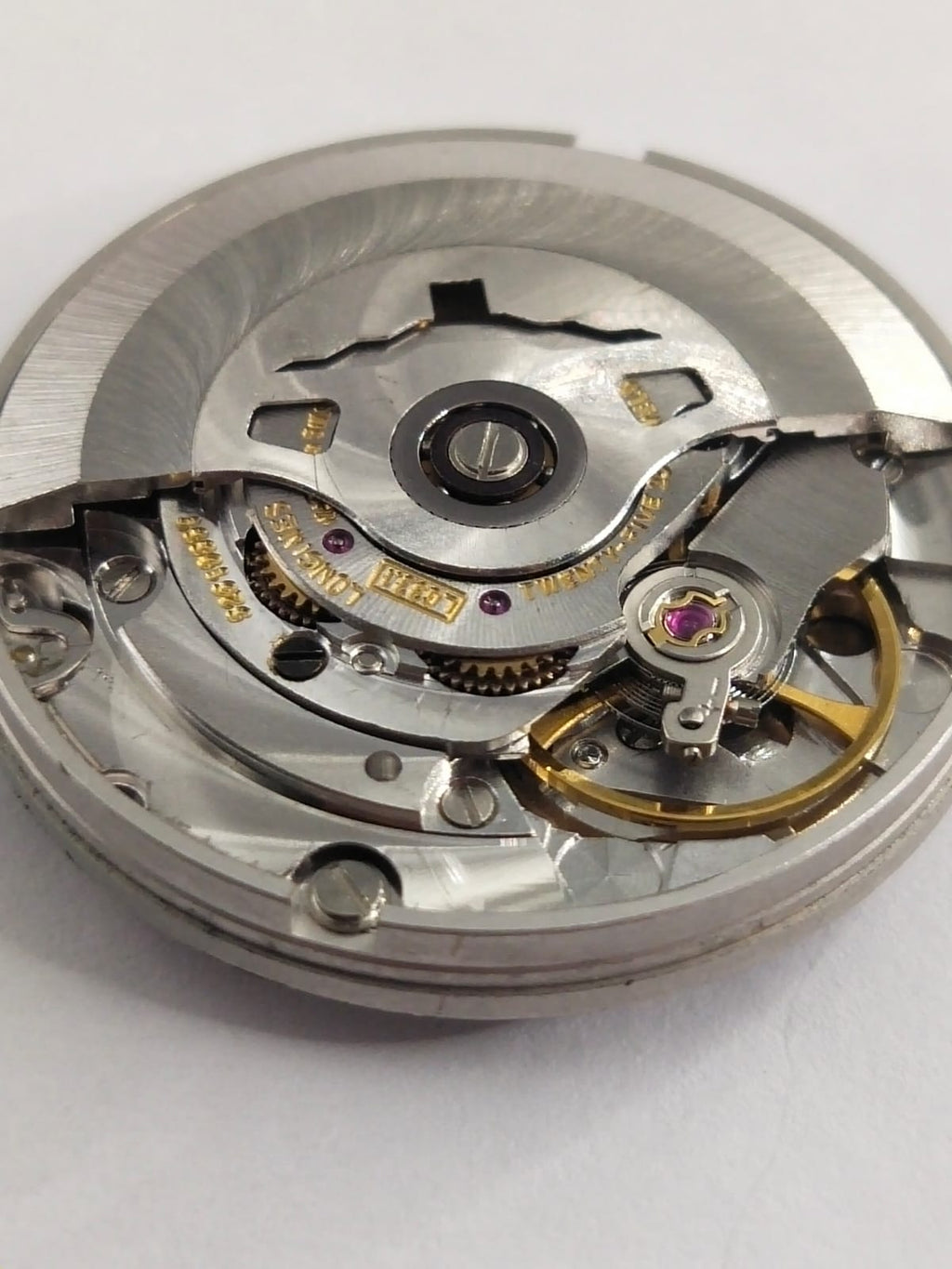 Longines Movement L633.1 / It works fine / Hour wheel missing...seconds column broken / Selling as pictured