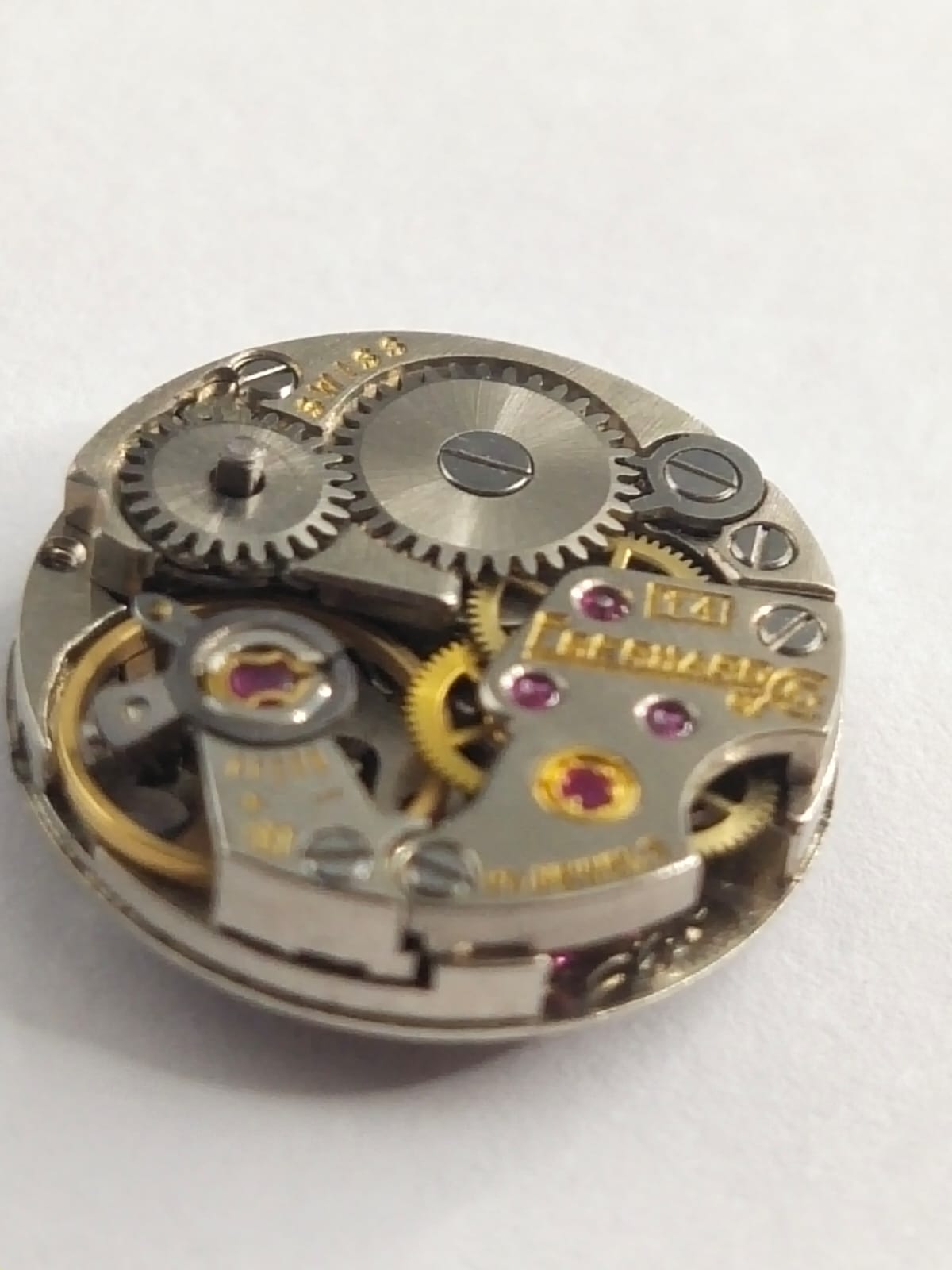 Manual movement / Eberhard works well / Hour wheel and column with minute wheel missing.....Selling as pictured