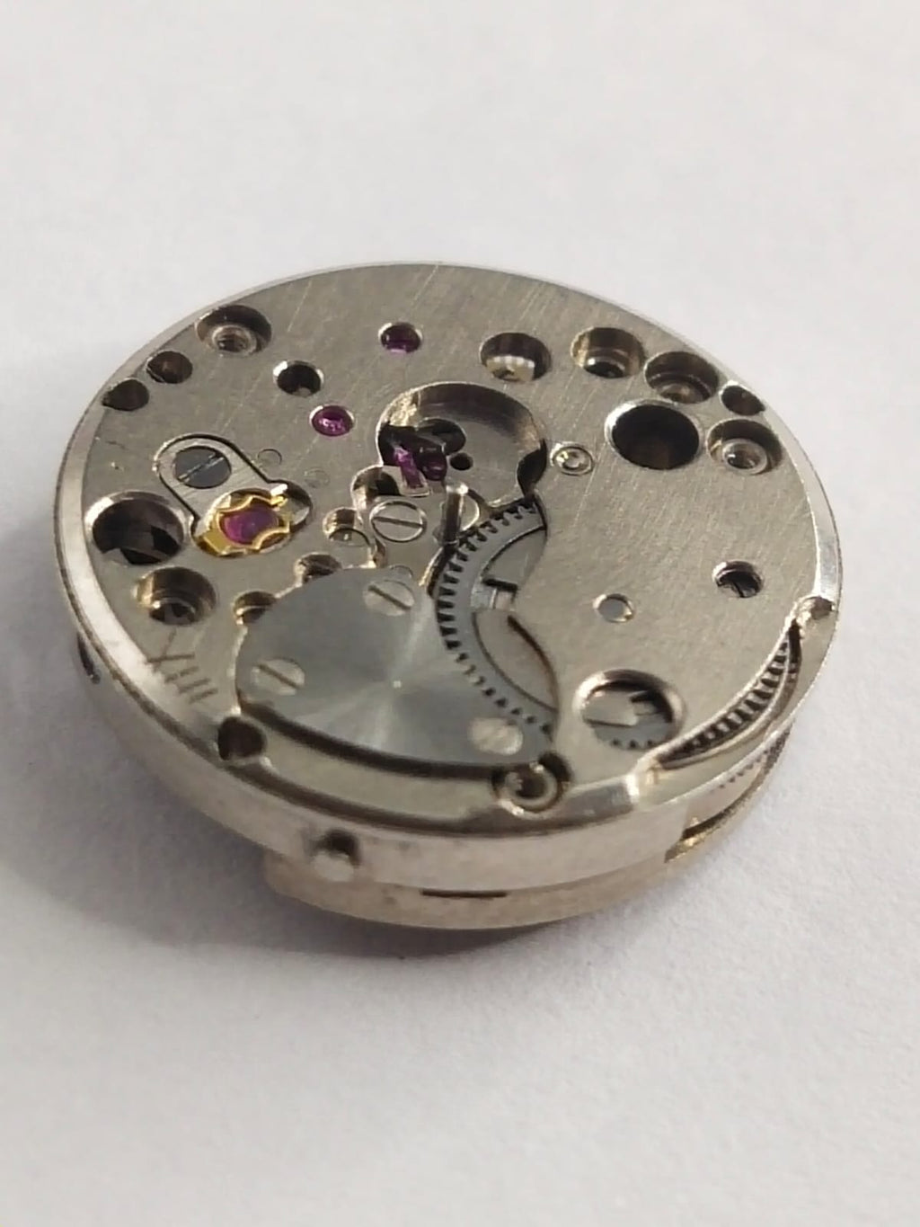 Manual movement / Eberhard works well / Hour wheel and column with minute wheel missing.....Selling as pictured