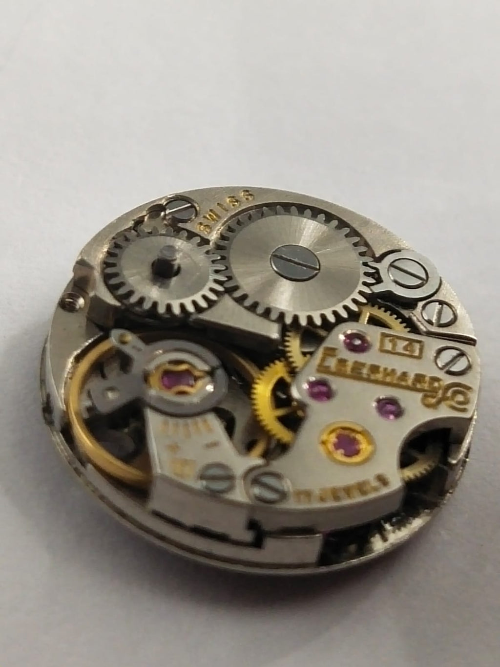 Manual movement / Eberhard works well / Hour wheel and column with minute wheel missing.....Selling as pictured
