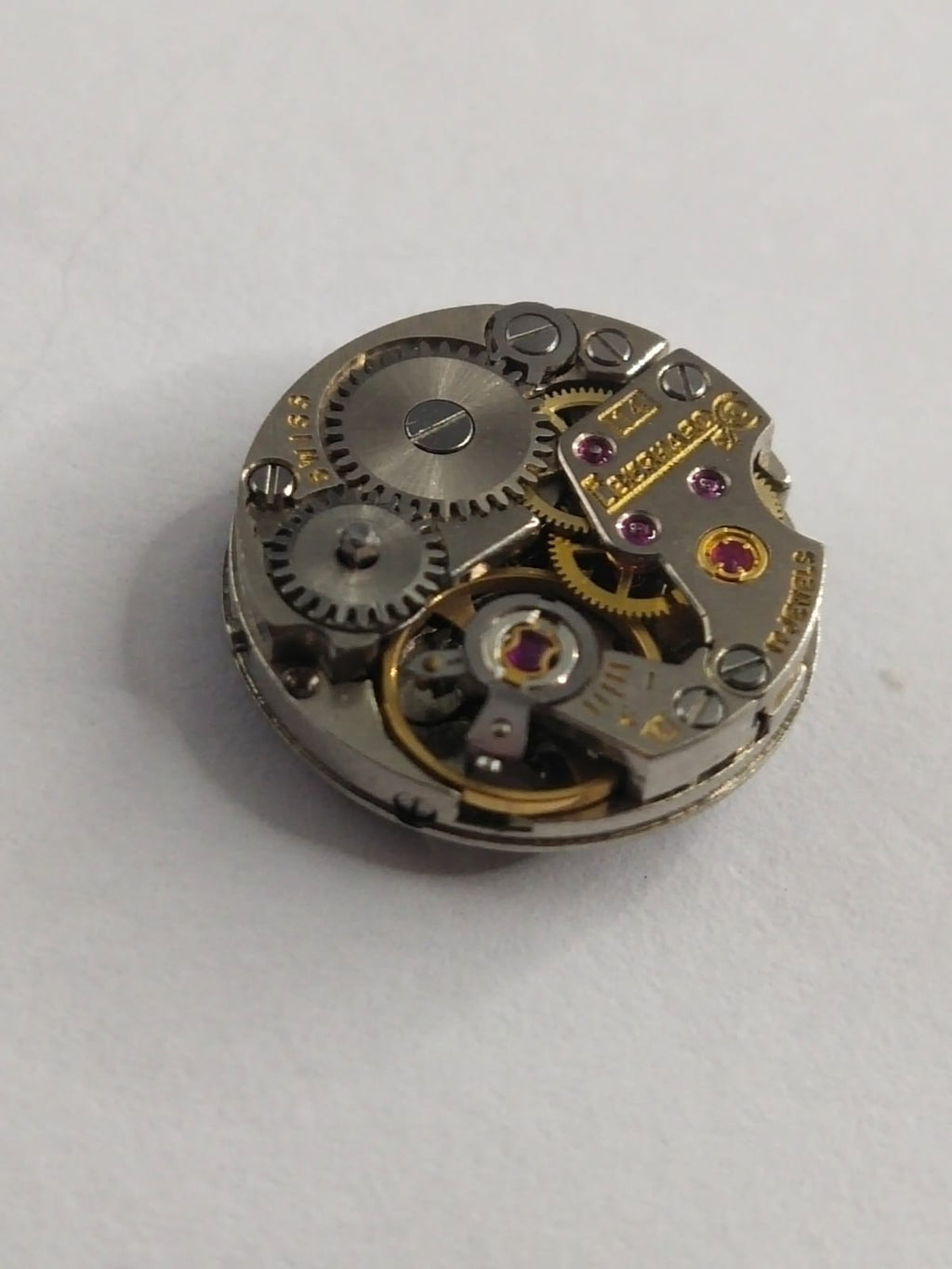 Manual movement / Eberhard works well / Hour wheel and column with minute wheel missing.....Selling as pictured